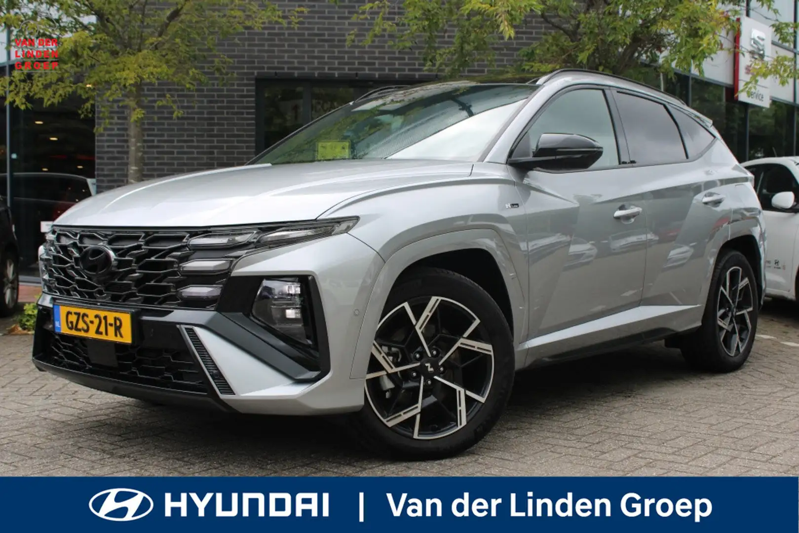 Hyundai TUCSON 1.6 T-GDI HEV N-Line Sky Full Option! + Trekhaak " Grijs - 1