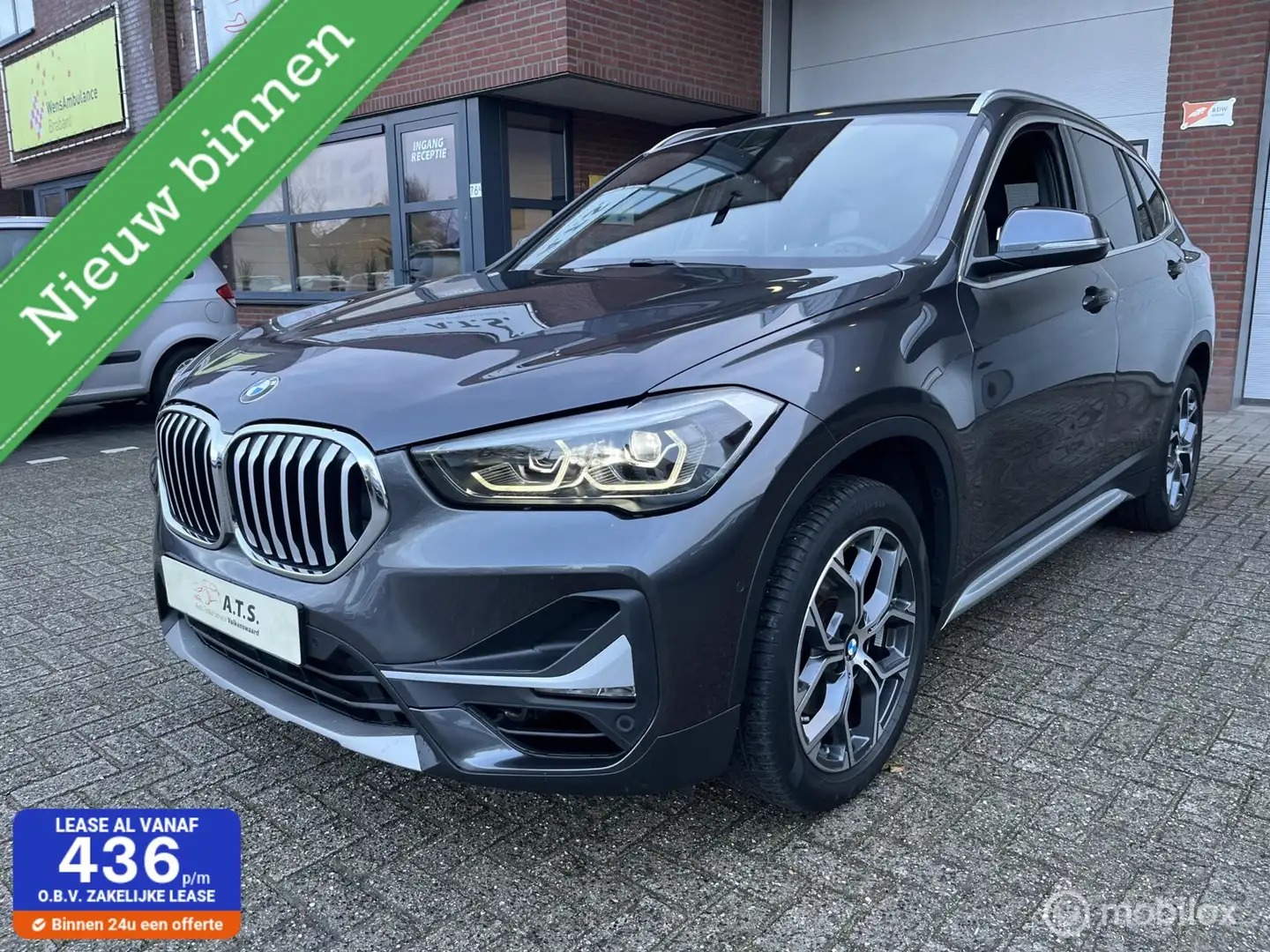 BMW X1 sDrive18i High Executive PANO-DAK*HUD*CAMERA*LEDER Grijs - 1