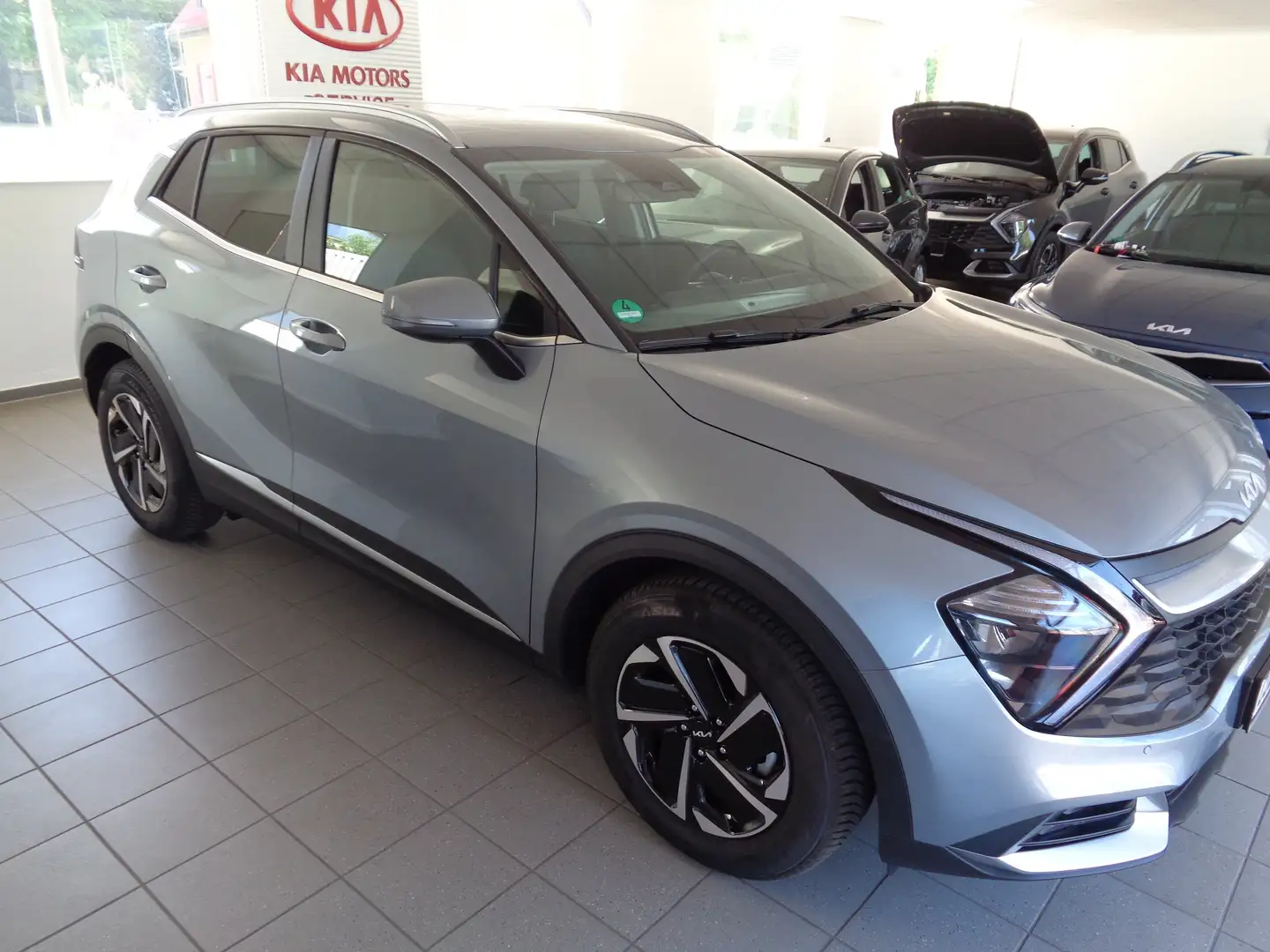 Kia Sportage 1.6 T-GDI AWD Eco-Dyn.+ (48V M-H) DCT Vision  Komf Silber - 2