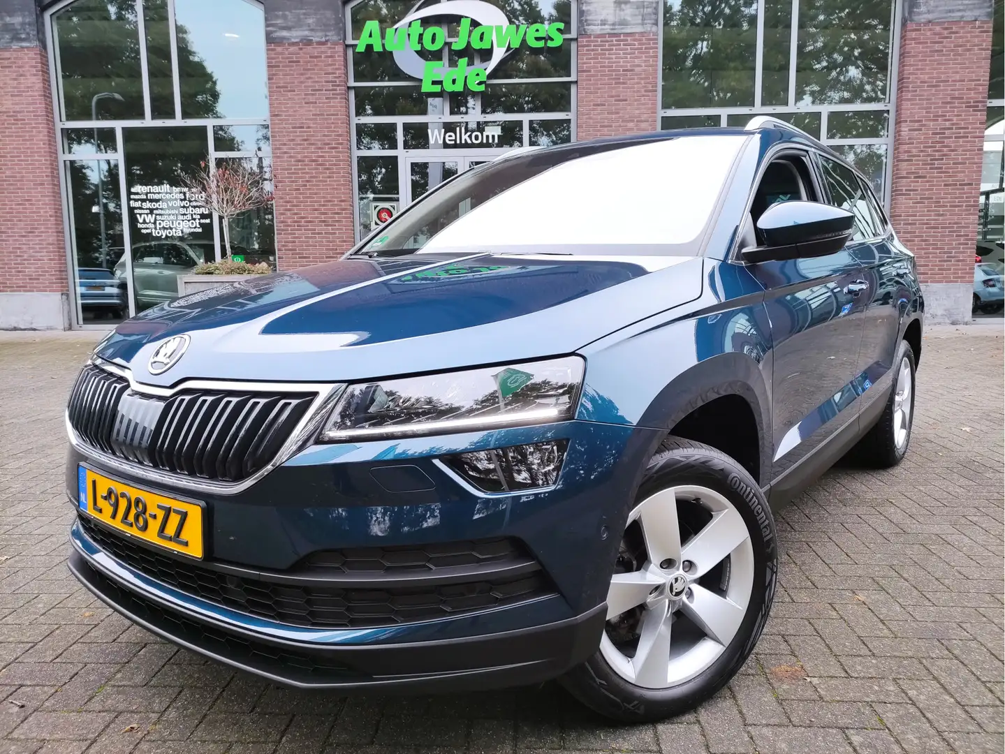 Skoda Karoq 1.5 TSI DSG ACT Business Edition Plus Wegklapbare Blauw - 1