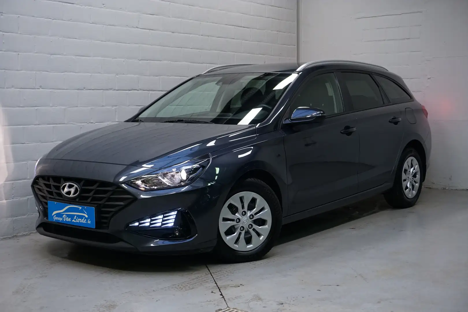 Hyundai i30 Wagon 1.0 T-GDi Sky Sensation Automaat-Apple Crply Blauw - 1