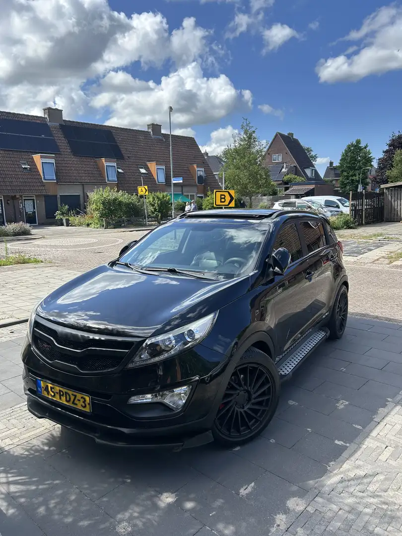 Kia Sportage 1.6 GDI ISG X-ecut.+ Exclusive Black Edition Zwart - 1