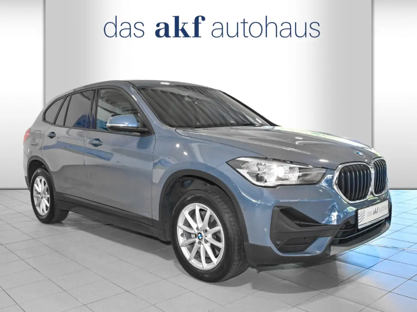 BMW X1 xDrive 20 i Advantage Aut.-Navi Plus*AHK*PDC*Panor Gris - 2