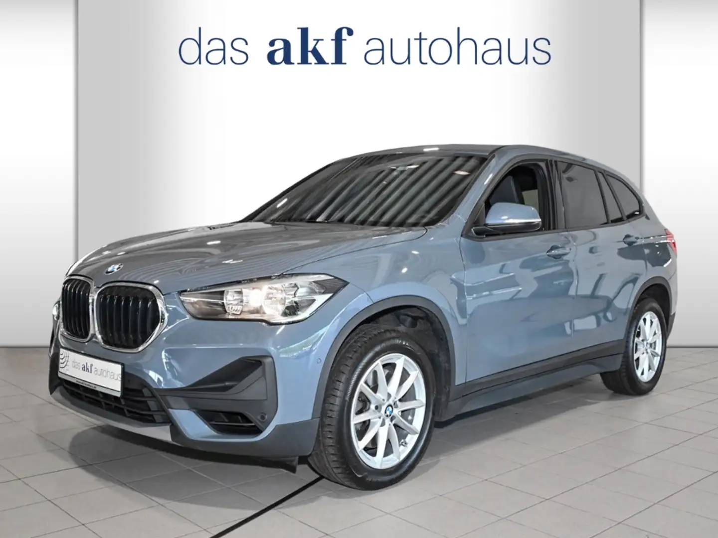 BMW X1 xDrive 20 i Advantage Aut.-Navi Plus*AHK*PDC*Panor Gris - 1