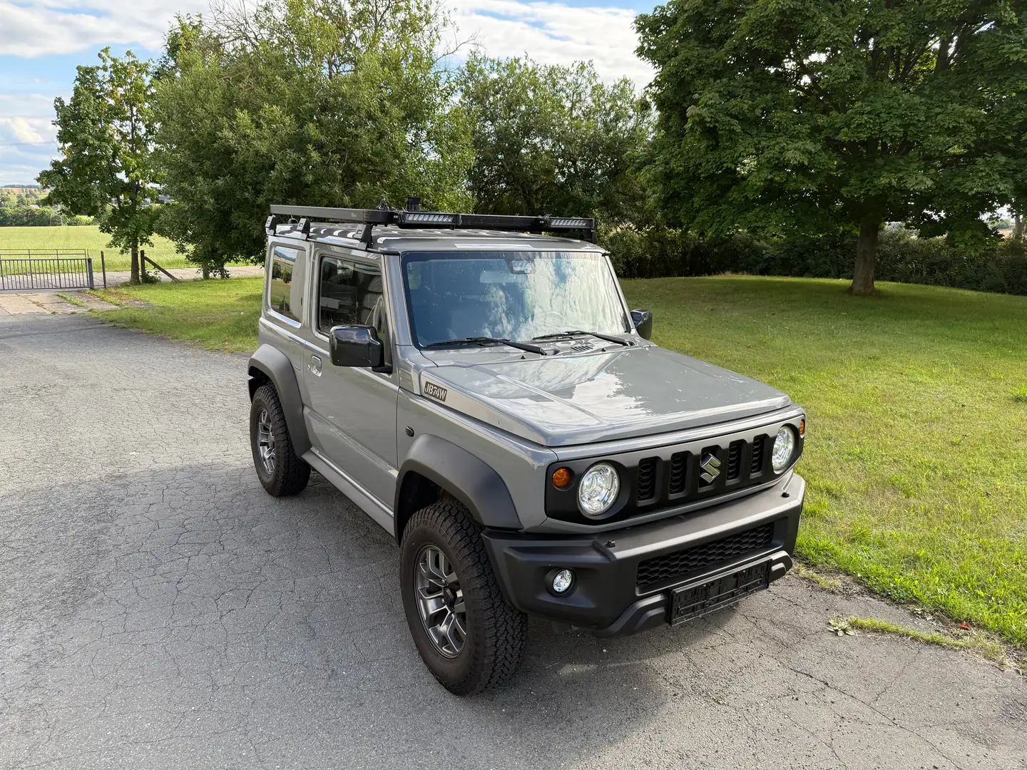 Suzuki Jimny 1.5 ALLGRIP Comfort+ LED 4 Sitze GJ 4x4 Navi LED Grau - 1
