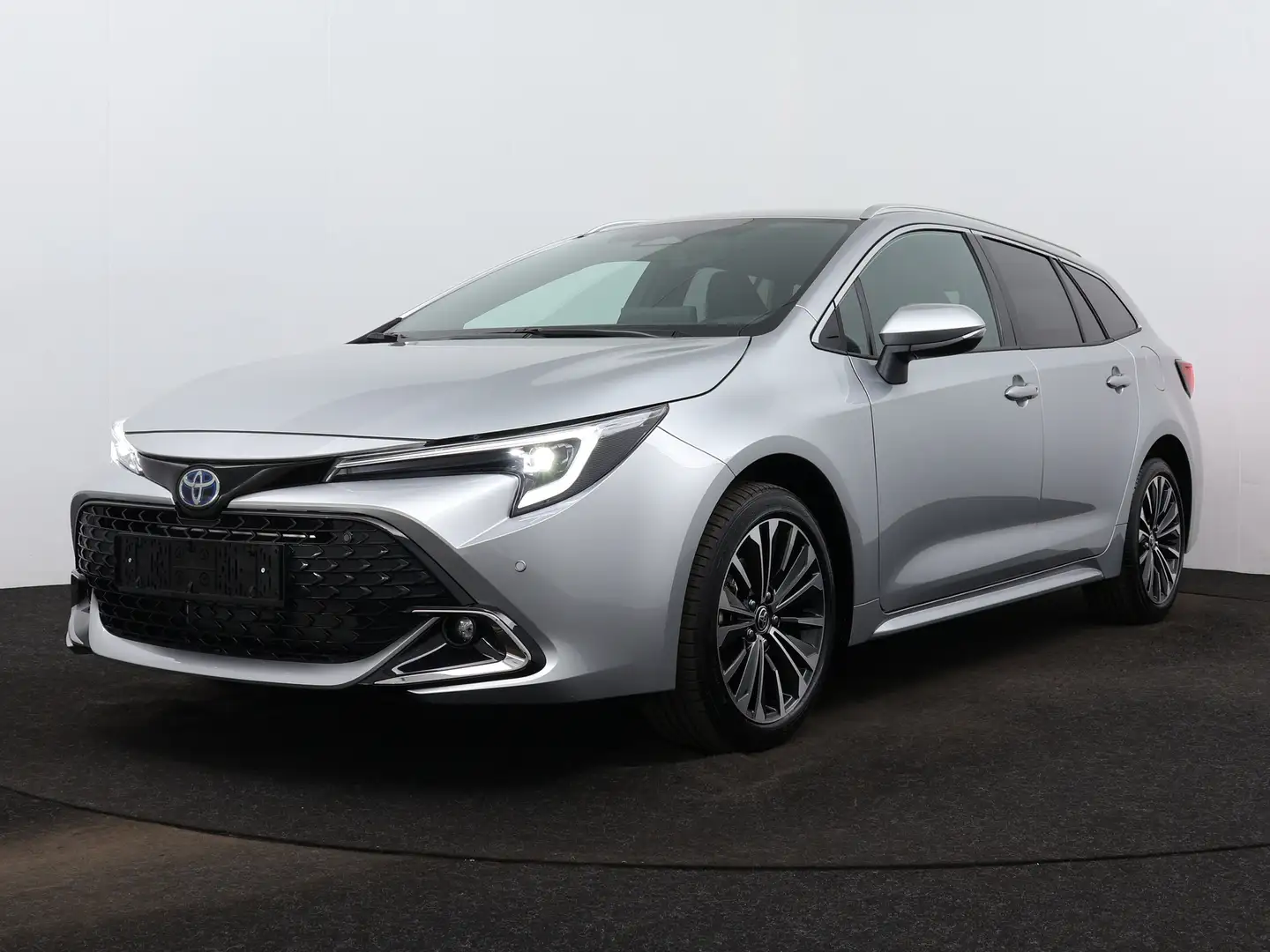 Toyota Corolla Touring Sports 1.8 Hybrid First Edition | Apple Ca Zilver - 1