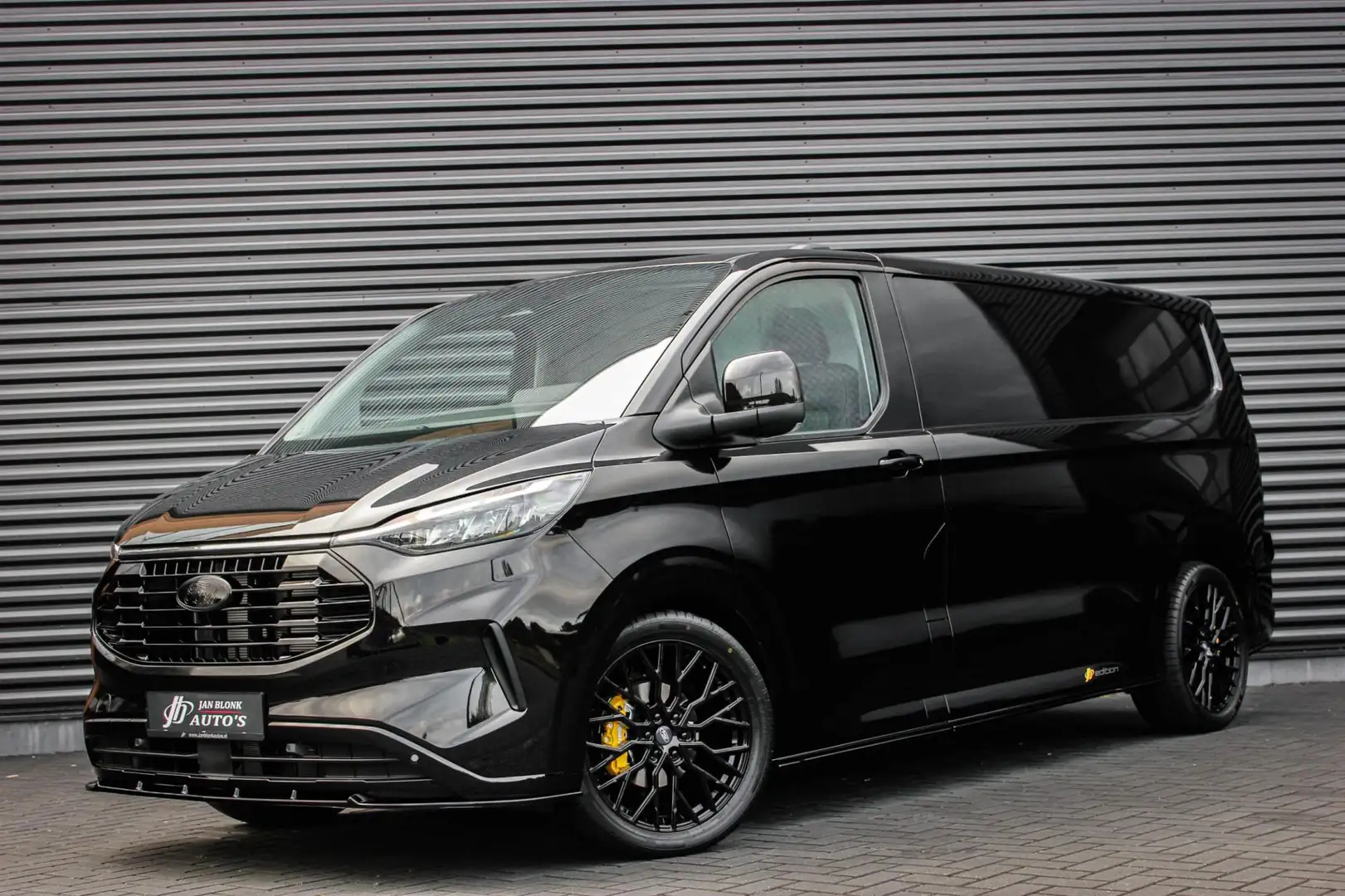 Ford Transit Custom 320 2.0 TDCI L2H1 Limited 170PK JB- EDITION / DRIV Zwart - 1