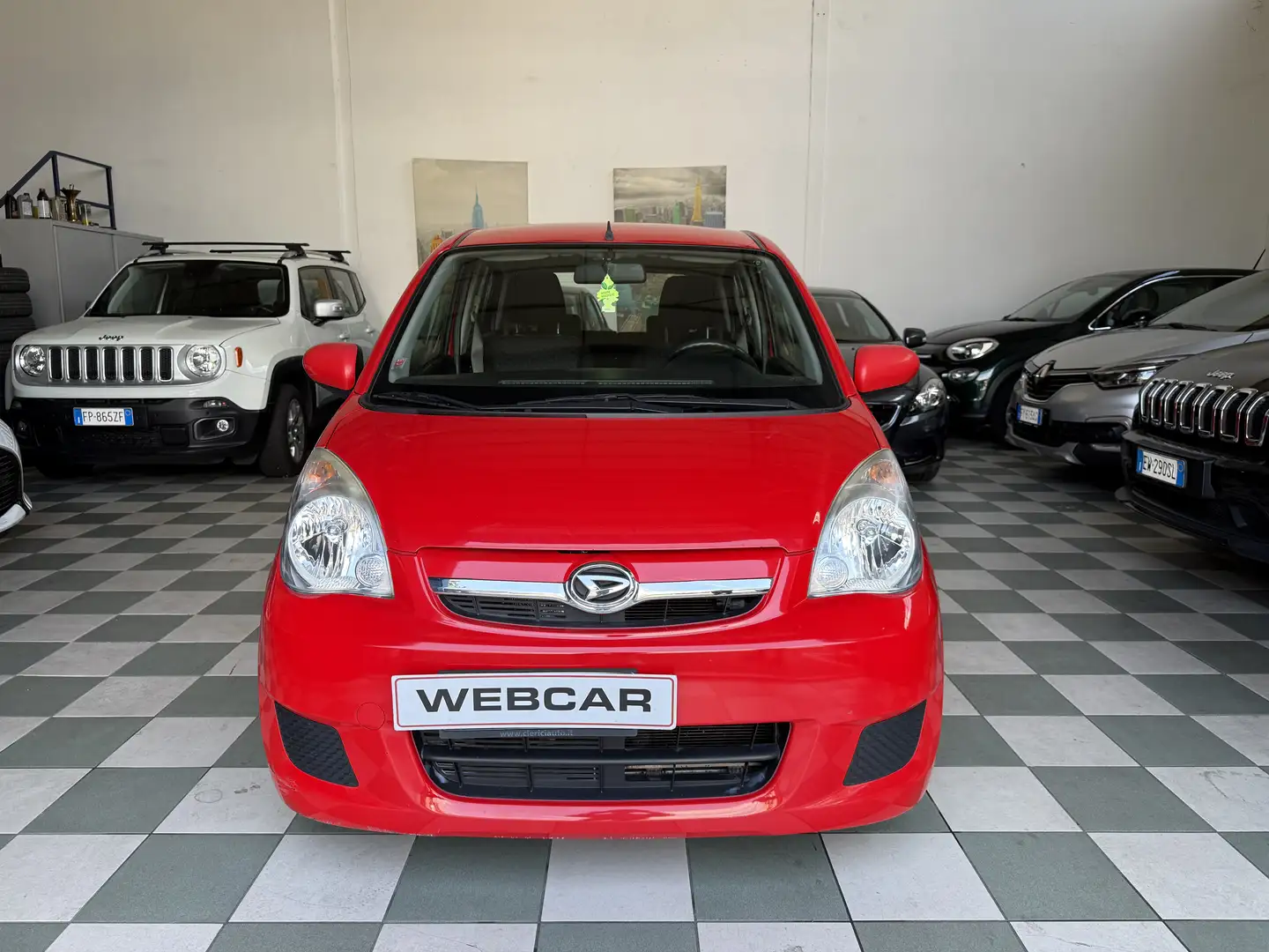 Daihatsu Cuore 5p 1.0 Sho c/clima,radio Rosso - 1