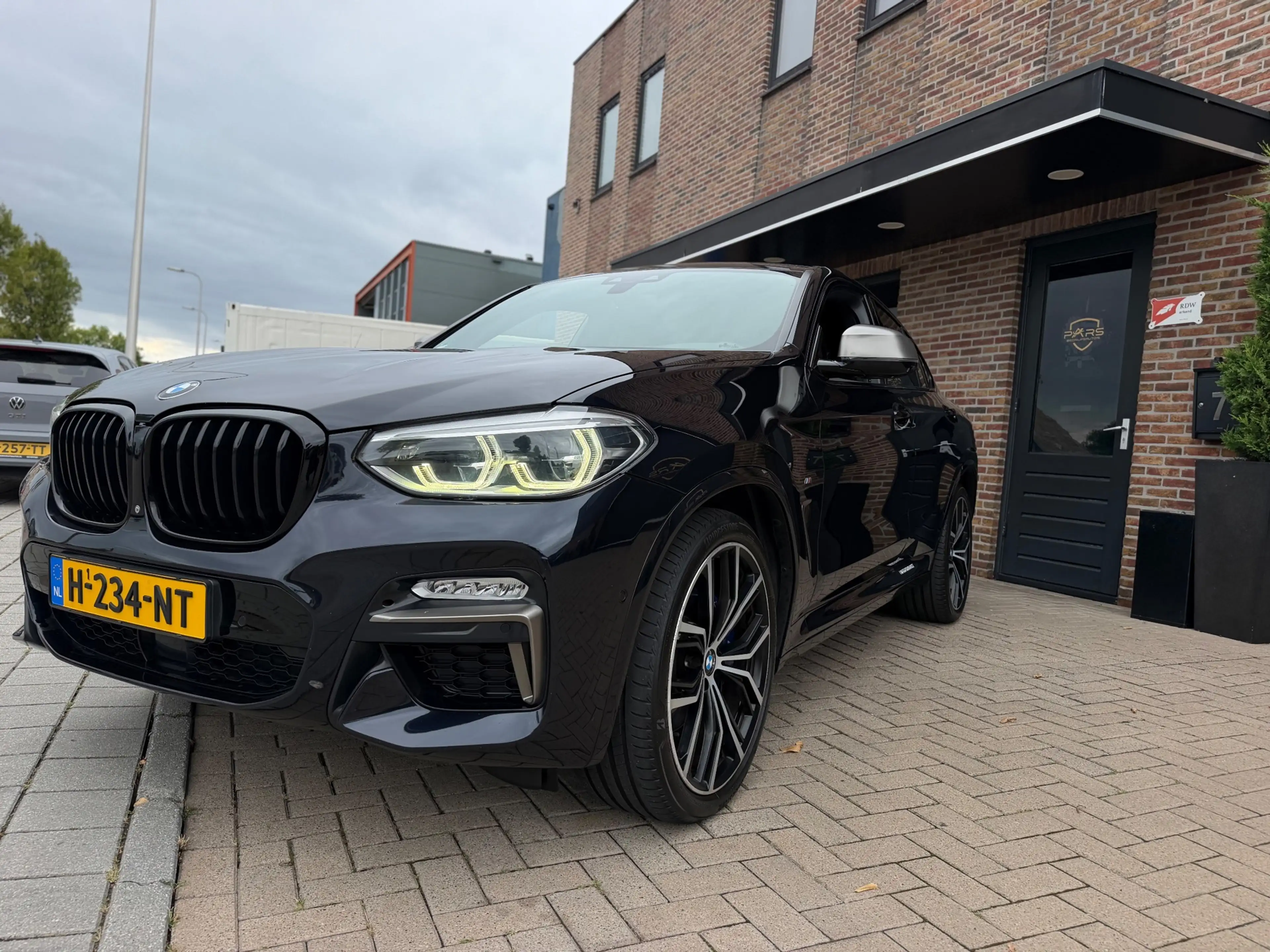 BMW X4 M40i High Executive — photo 11