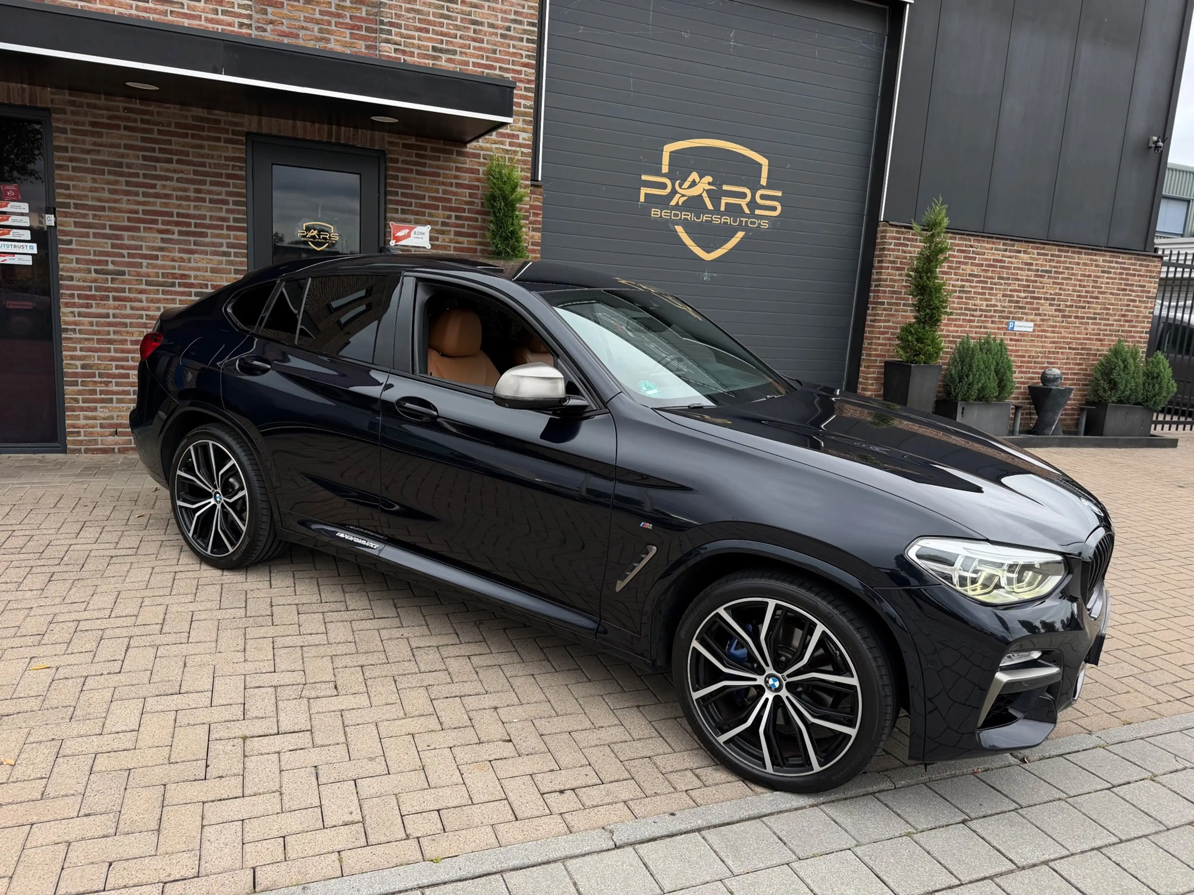 BMW X4 M40i High Executive — photo 7