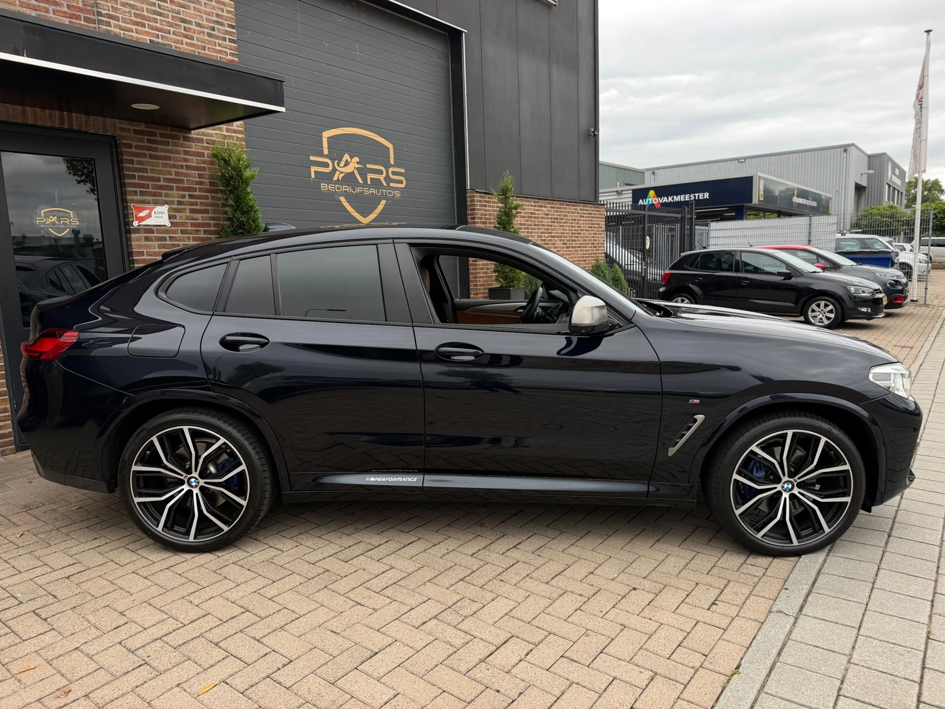 BMW X4 M40i High Executive — photo 8
