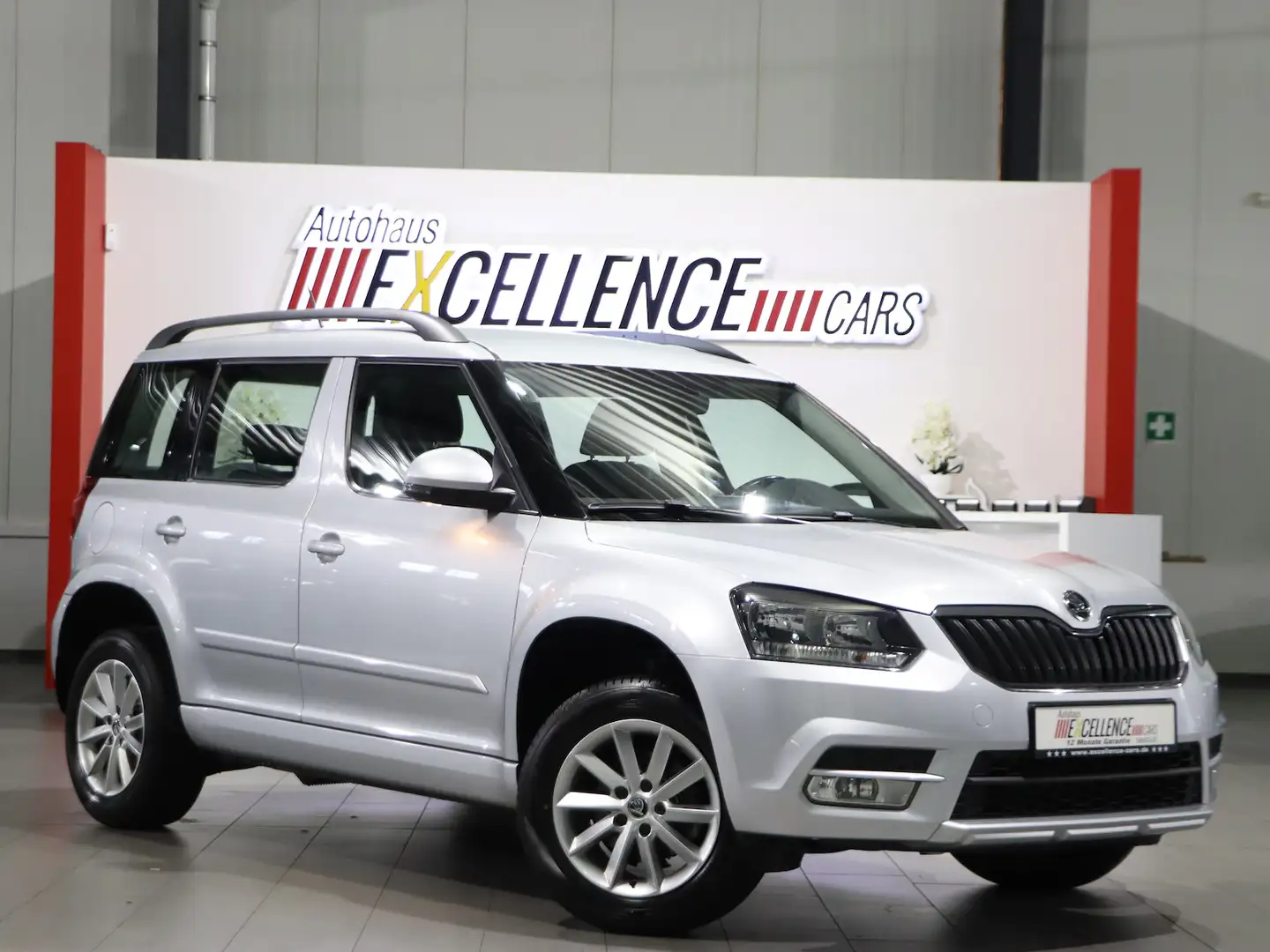 Skoda Yeti 1.2 TSI AMBITION / 1.HAND / OPTIK-PAKET / Silber - 1