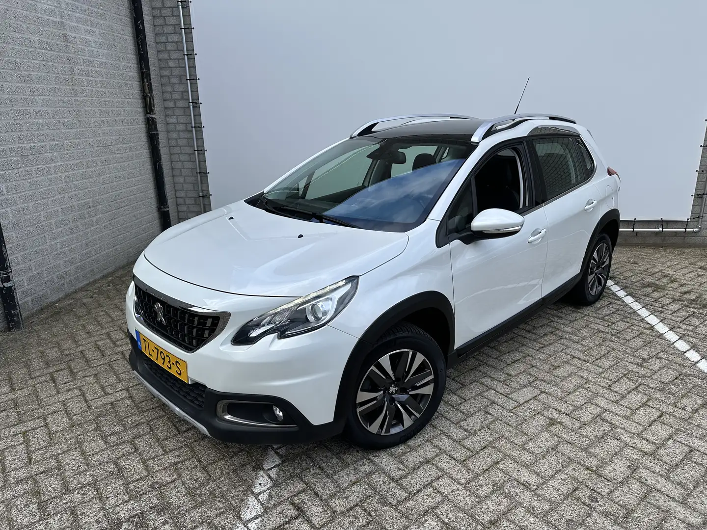 Peugeot 2008 1.2 PureTech Allure | Achterbank in delen neerklap Blanc - 1
