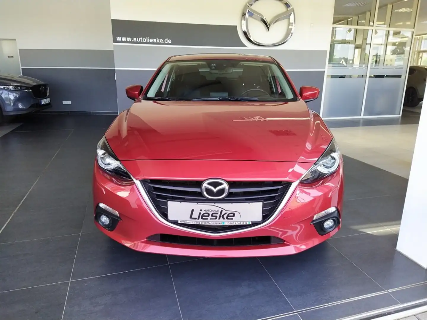 Mazda 3 S SKYACTIV-G 120 6GS AL-CENTER TOU-P LIC-P NAV Rojo - 1