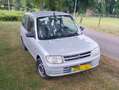 Daihatsu Cuore Cuore 1.0-12V XTi Grijs - thumbnail 1