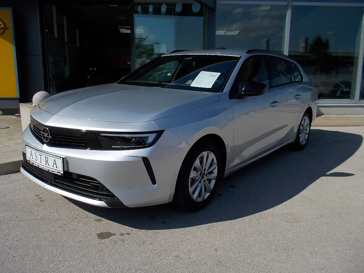 Opel Astra ST 1,2 Turbo MHEV Edition Aut. Zilver - 1