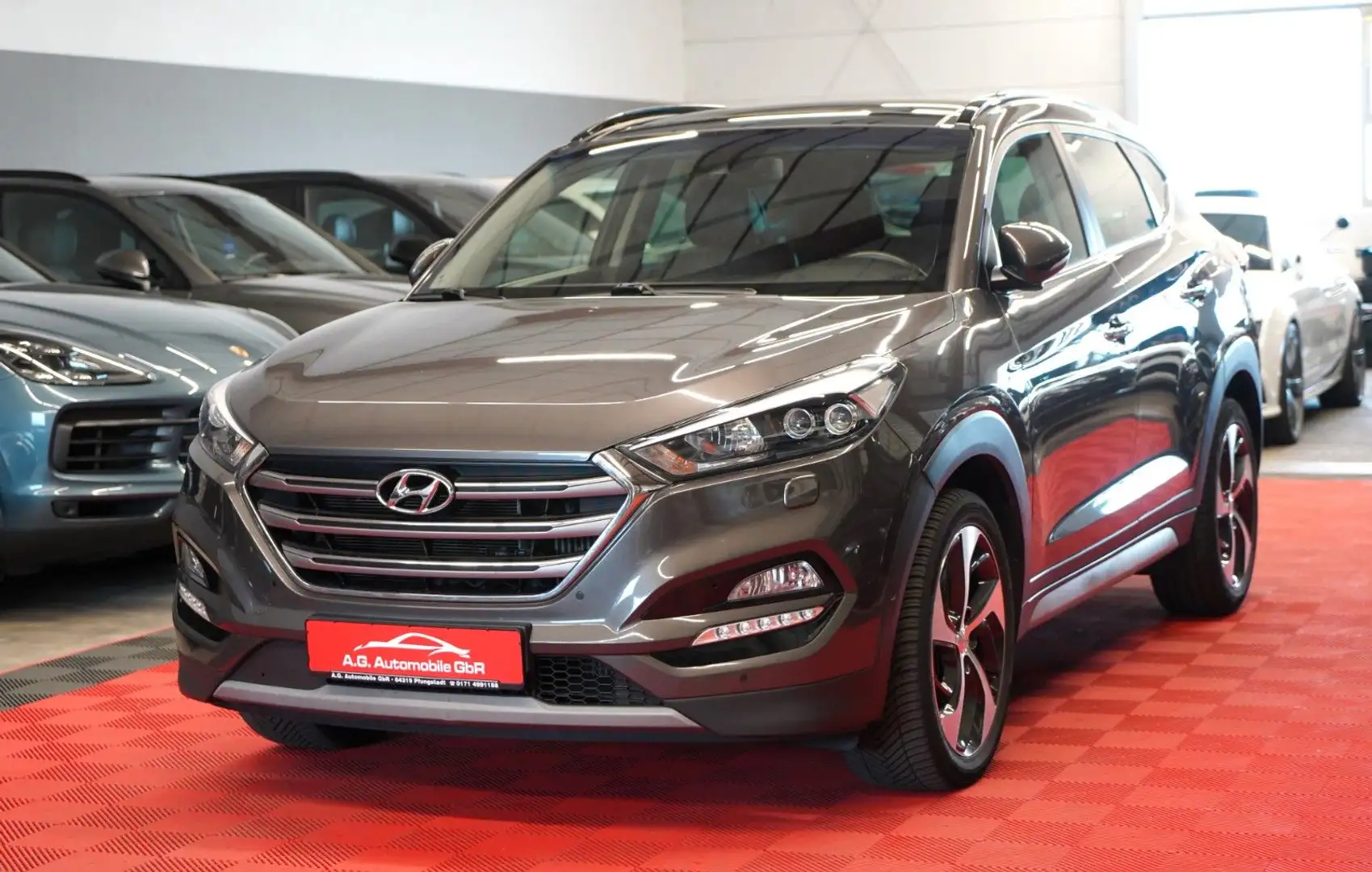 Hyundai TUCSON 1.6 T-GDI Aut. Premium 4WD LED*Spur*Temp* Grau - 1