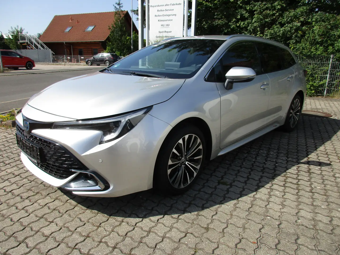 Toyota Corolla 2.0 Hybrid Touring Sports Team-D +Tech. Paket Argent - 1