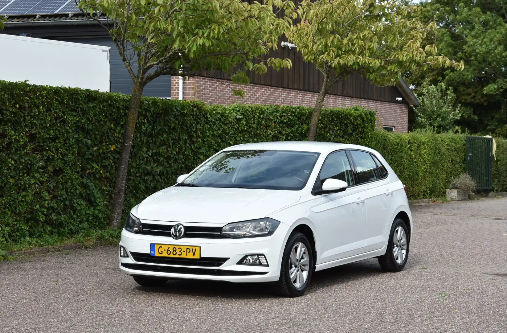 Volkswagen Polo 1.0 TSI 96 PK Navi DAB ACC Carplay NAP 1e eigenaar Weiß - 1