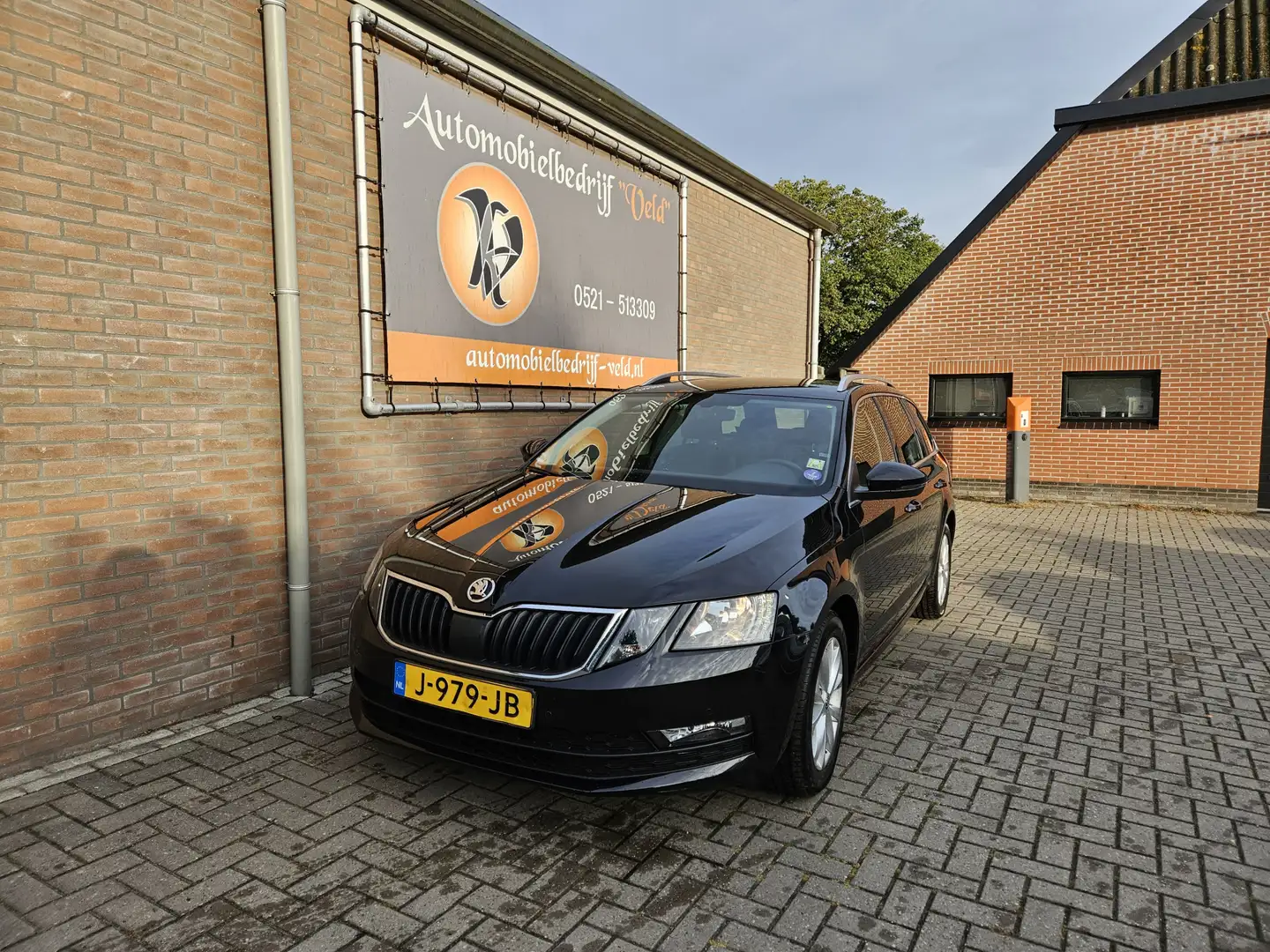 Skoda Octavia Combi 1.0 TSI Greentech Business Edition Zwart - 1