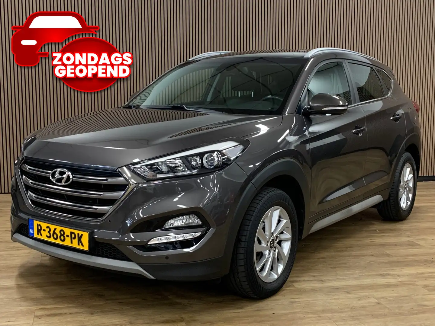 Hyundai TUCSON 1.6 GDi Premium|Camera|Navigatie|Climate Control| Bruin - 1
