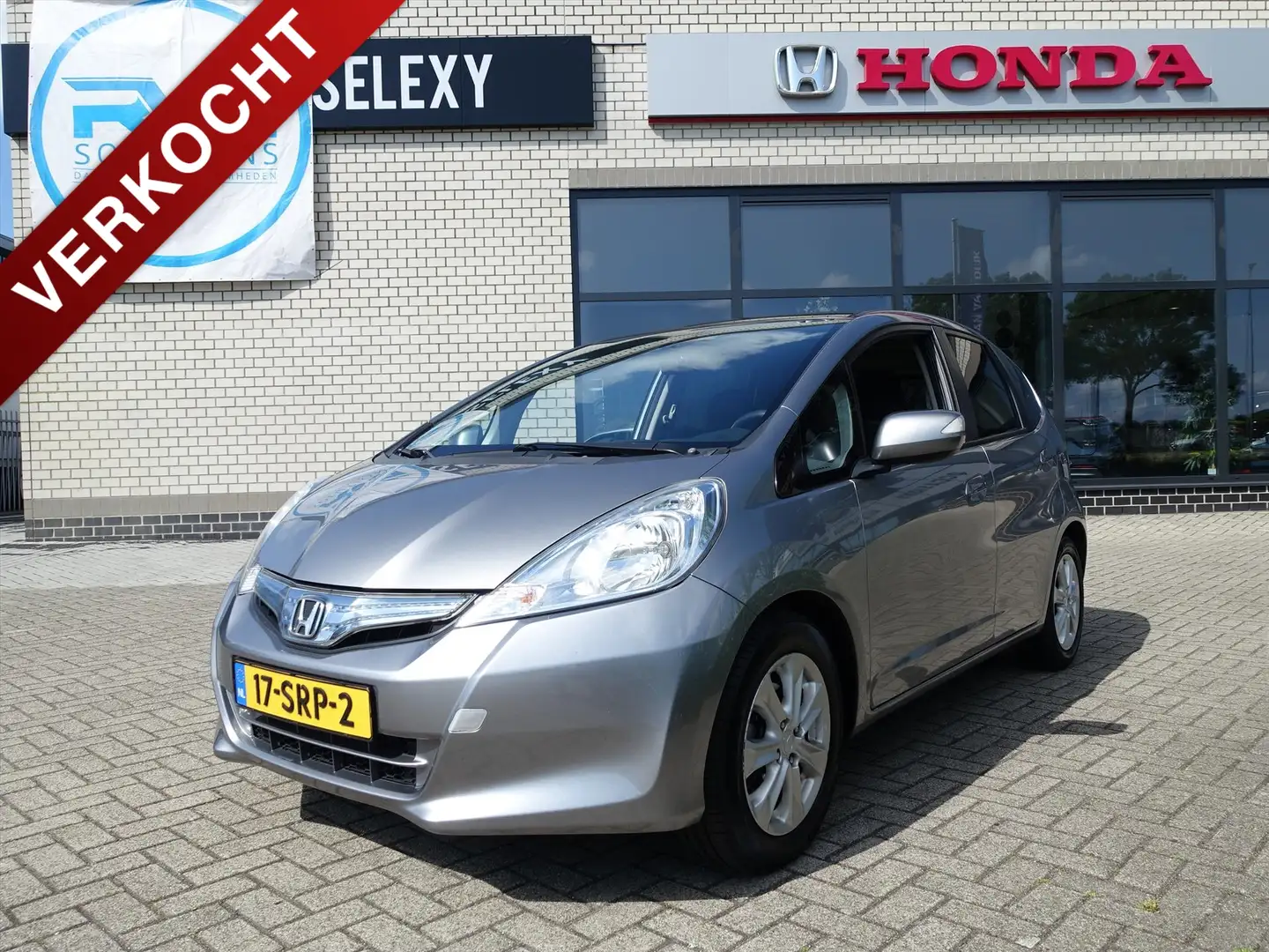 Honda Jazz Hybrid 1.4 i-VTEC 102pk CVT Elegance 101583 km Gris - 1