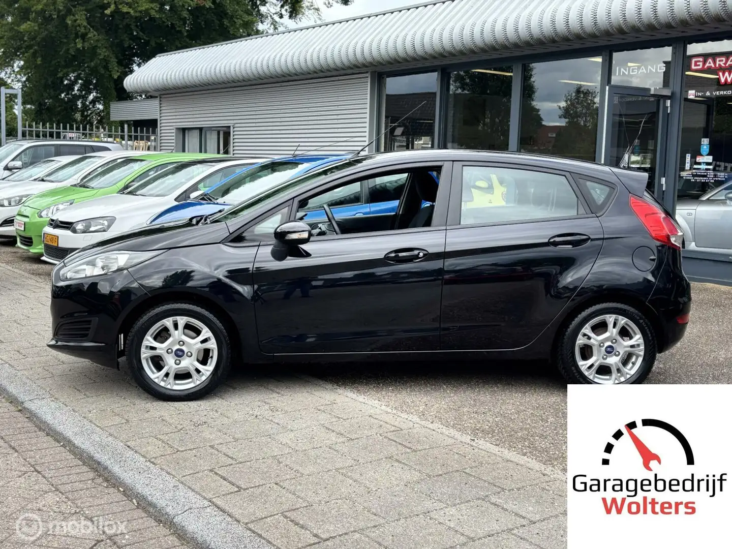 Ford Fiesta 1.25 82pk AIRCO 5DRS 1E EIGEN. STOELVERWARM. Zwart - 2