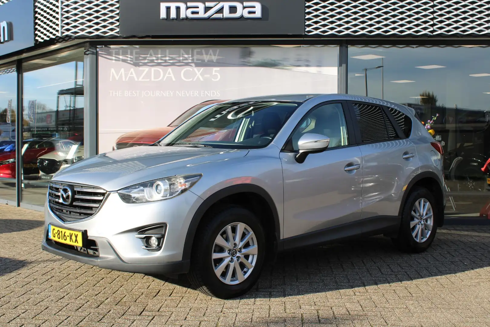 Mazda CX-5 2.0 SkyActiv-G 165 Skylease 2WD , Trekhaak, Navi, Gris - 2