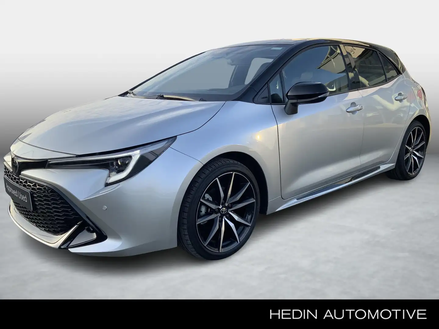 Toyota Corolla Hatchback 1.8 Hybrid CVT GR Sport | Panoramisch Da Zilver - 1