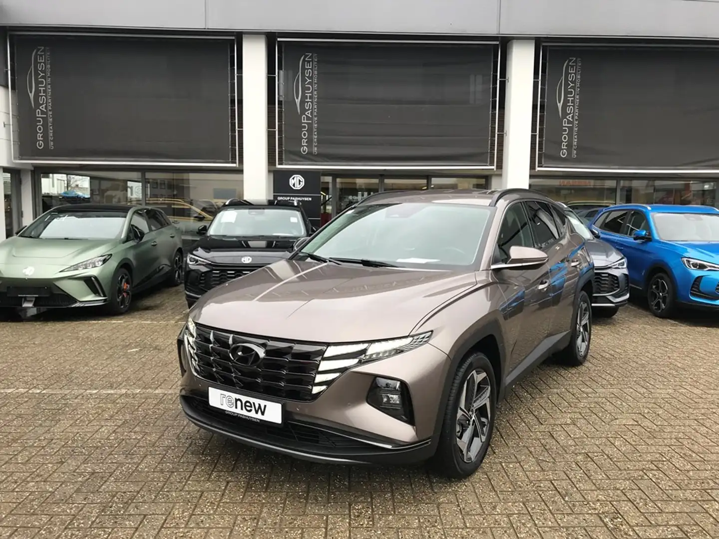 Hyundai TUCSON Feel HEV 1.6T-GDi 180PK AUTOMAAT Bronze - 1