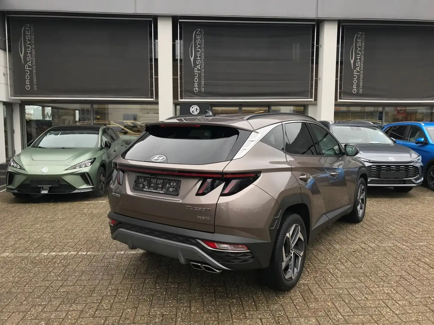 Hyundai TUCSON Feel HEV 1.6T-GDi 180PK AUTOMAAT Bronze - 2