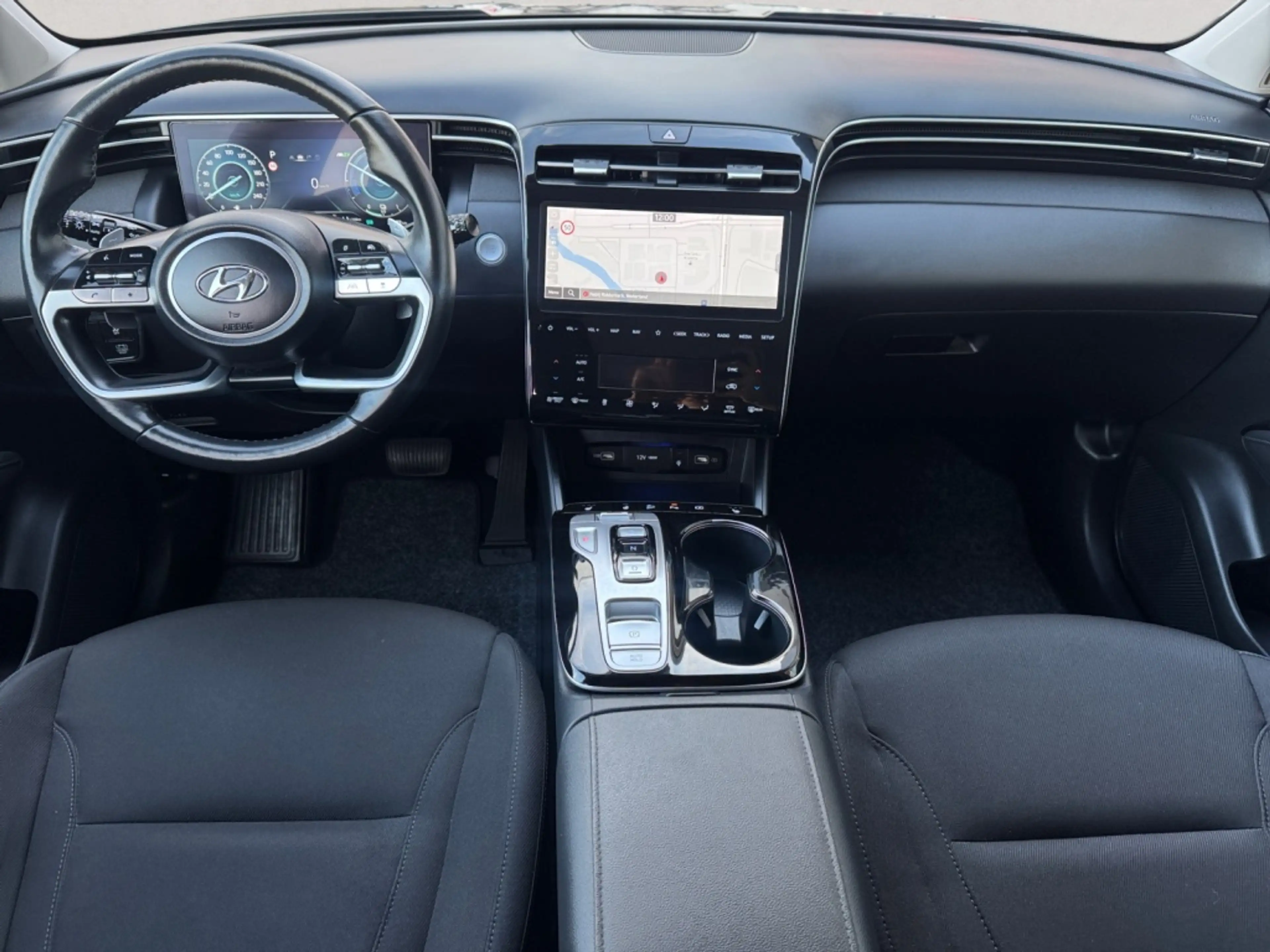 Hyundai TUCSON 1.6 T-GDI HEV Comf — photo 11