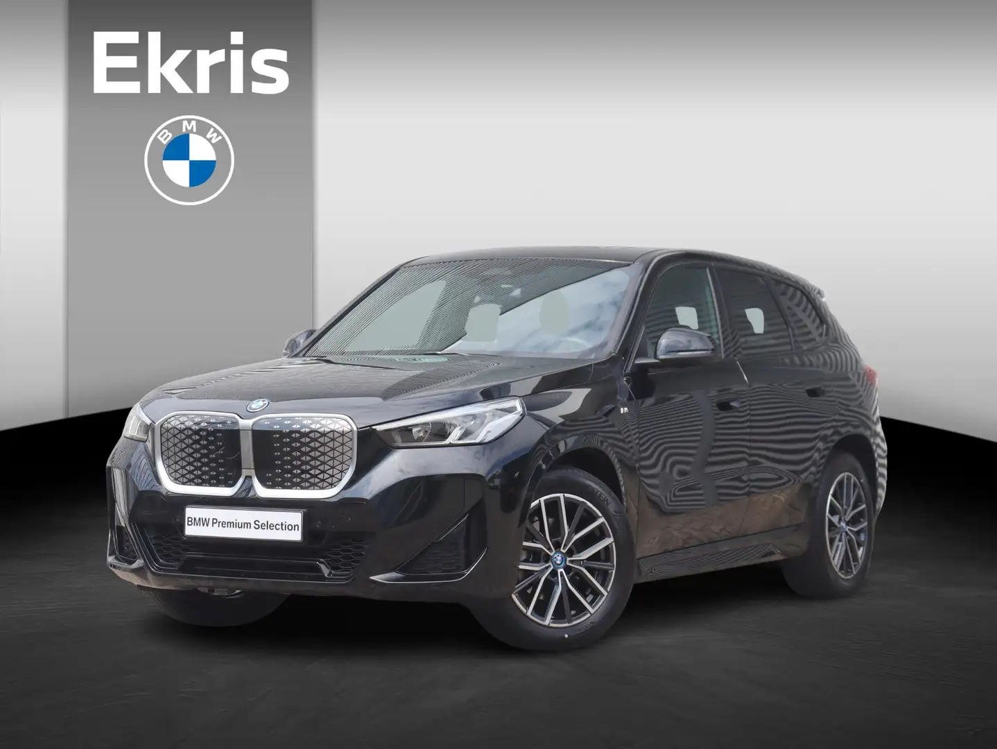 BMW iX1 eDrive20 | M Sportpakket | Panodak | Trekhaak | Ge Noir - 1