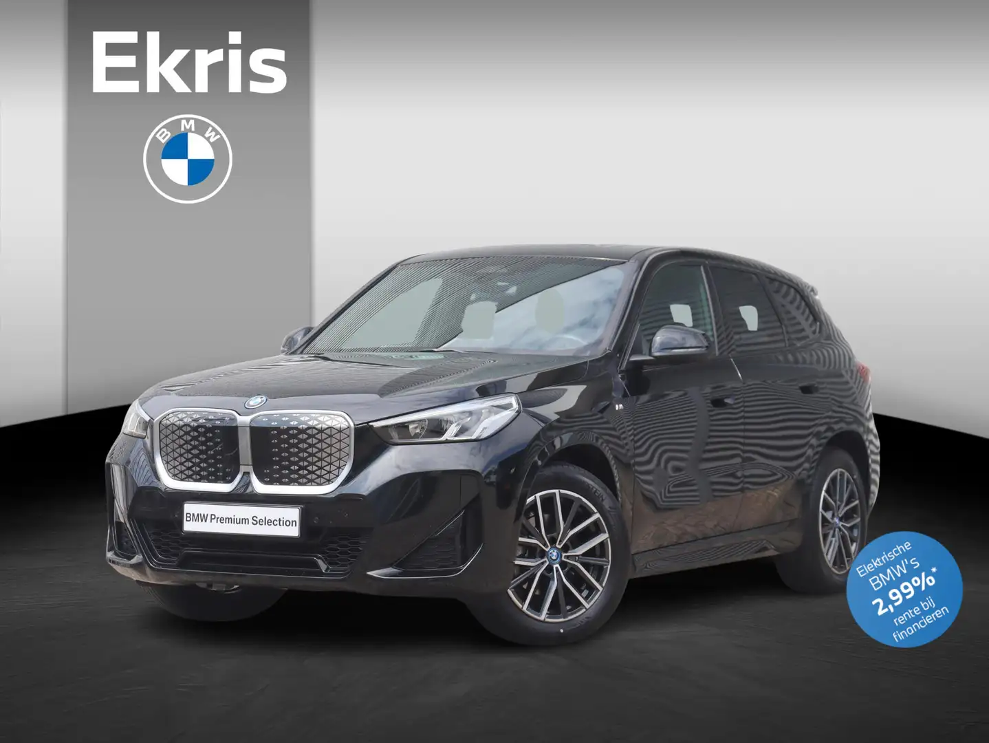 BMW iX1 eDrive20 | M Sportpakket | Panodak | Trekhaak | Ge Zwart - 1