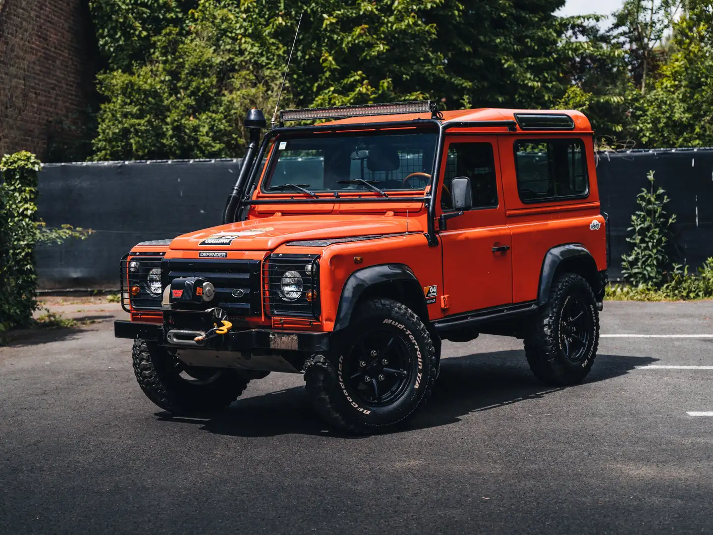 Land Rover Defender 2.5 Td5 G4 Challenge // 6 SEATS POSSIBLE Orange - 1