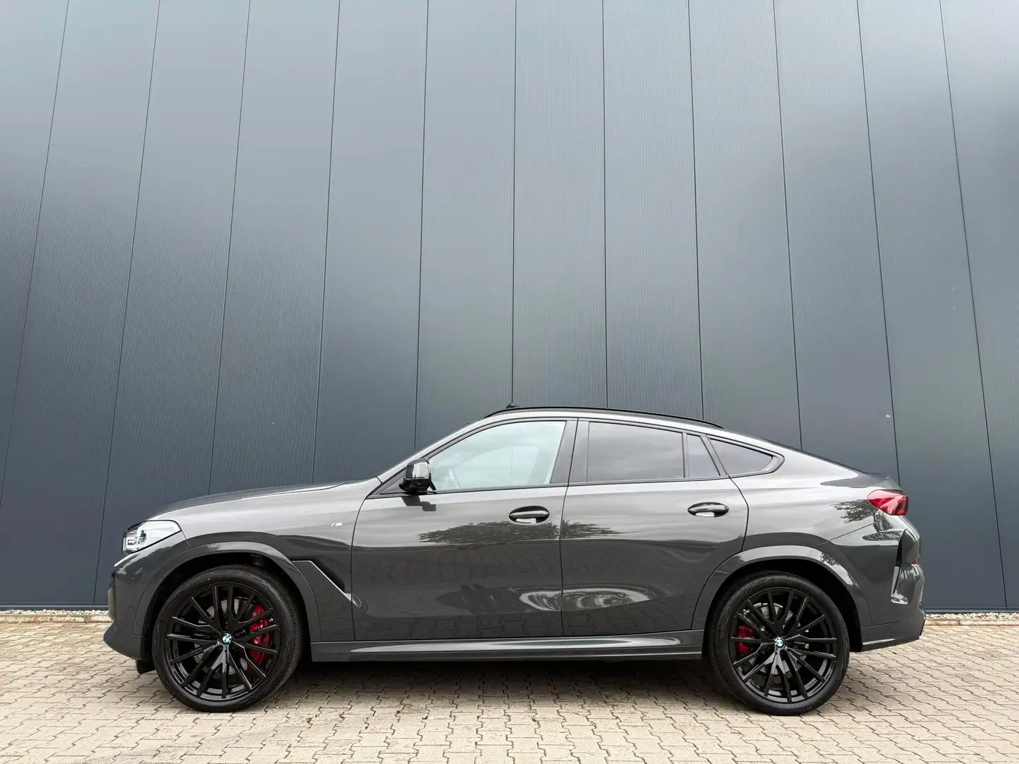BMW X6 xDrive40d M-sport / pano / 22 inch / HUD / Dravite Grijs - 2