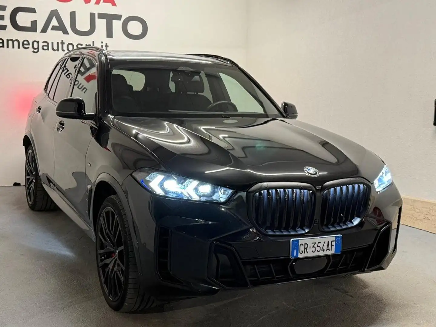 BMW X5 xDrive30d 48V Msport Zwart - 2