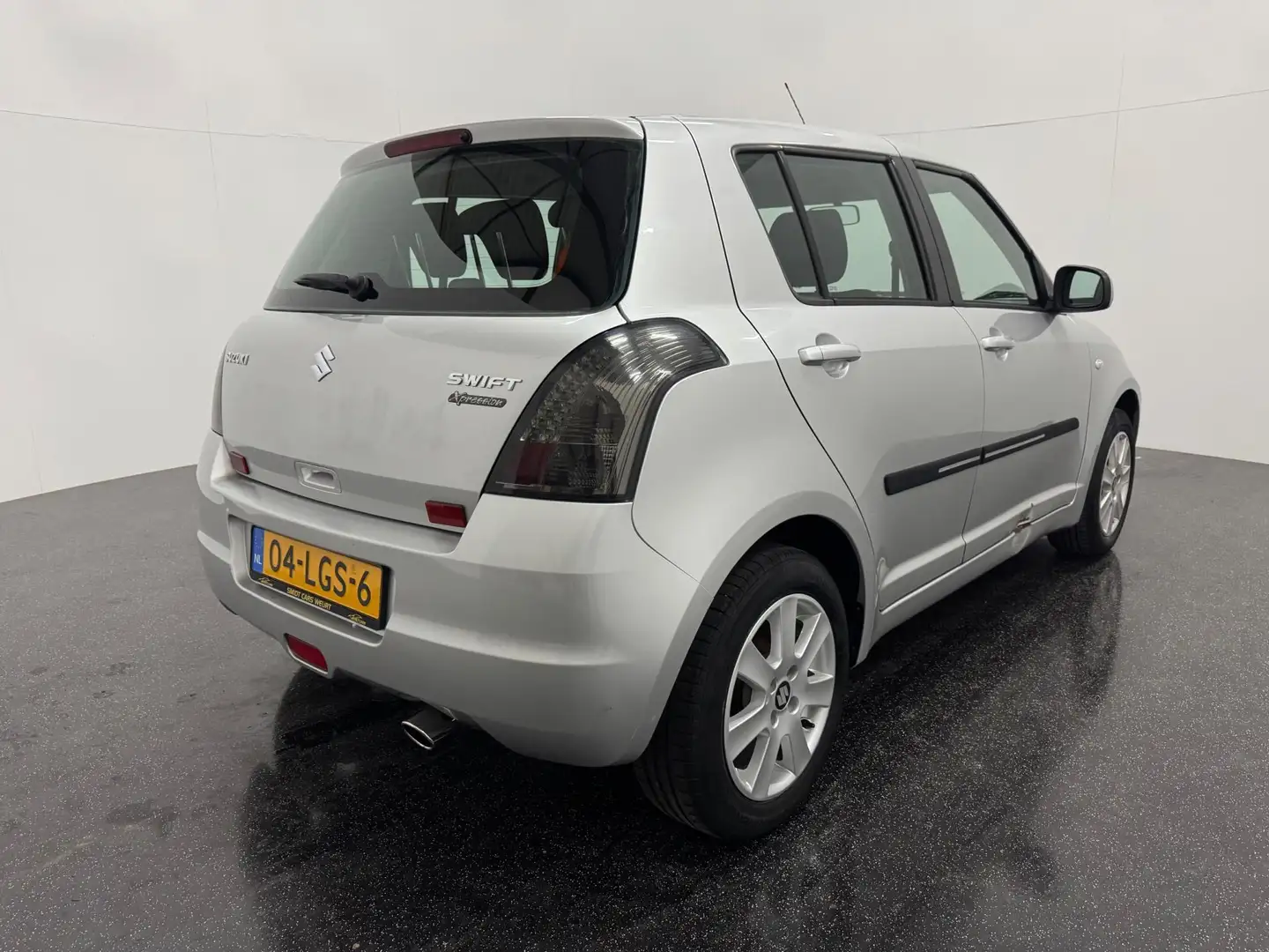 Suzuki Swift 1.3 Comfort Airco Grijs - 2