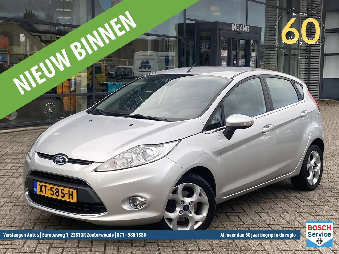 Ford Fiesta 1.4 71KW 5DR Ghia Grijs - 1