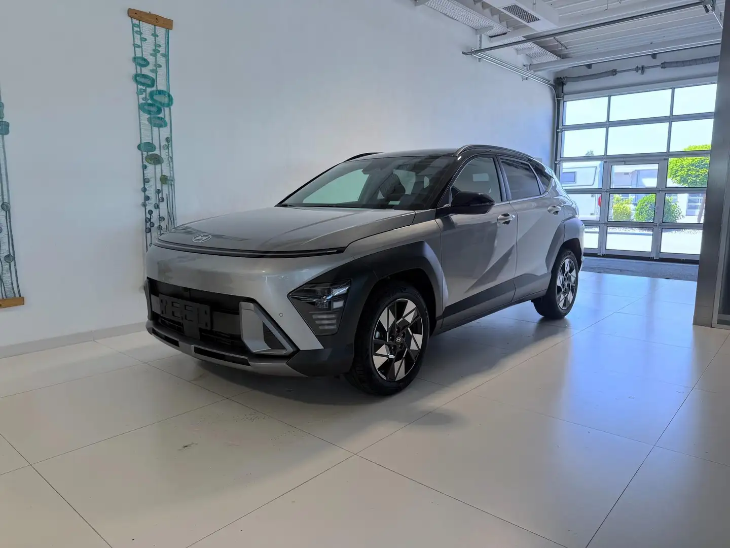 Hyundai KONA GO+ 1.6 T-GDI 2WD DCT 102 kW (139 PS) 2-Zonen-K... Silber - 1