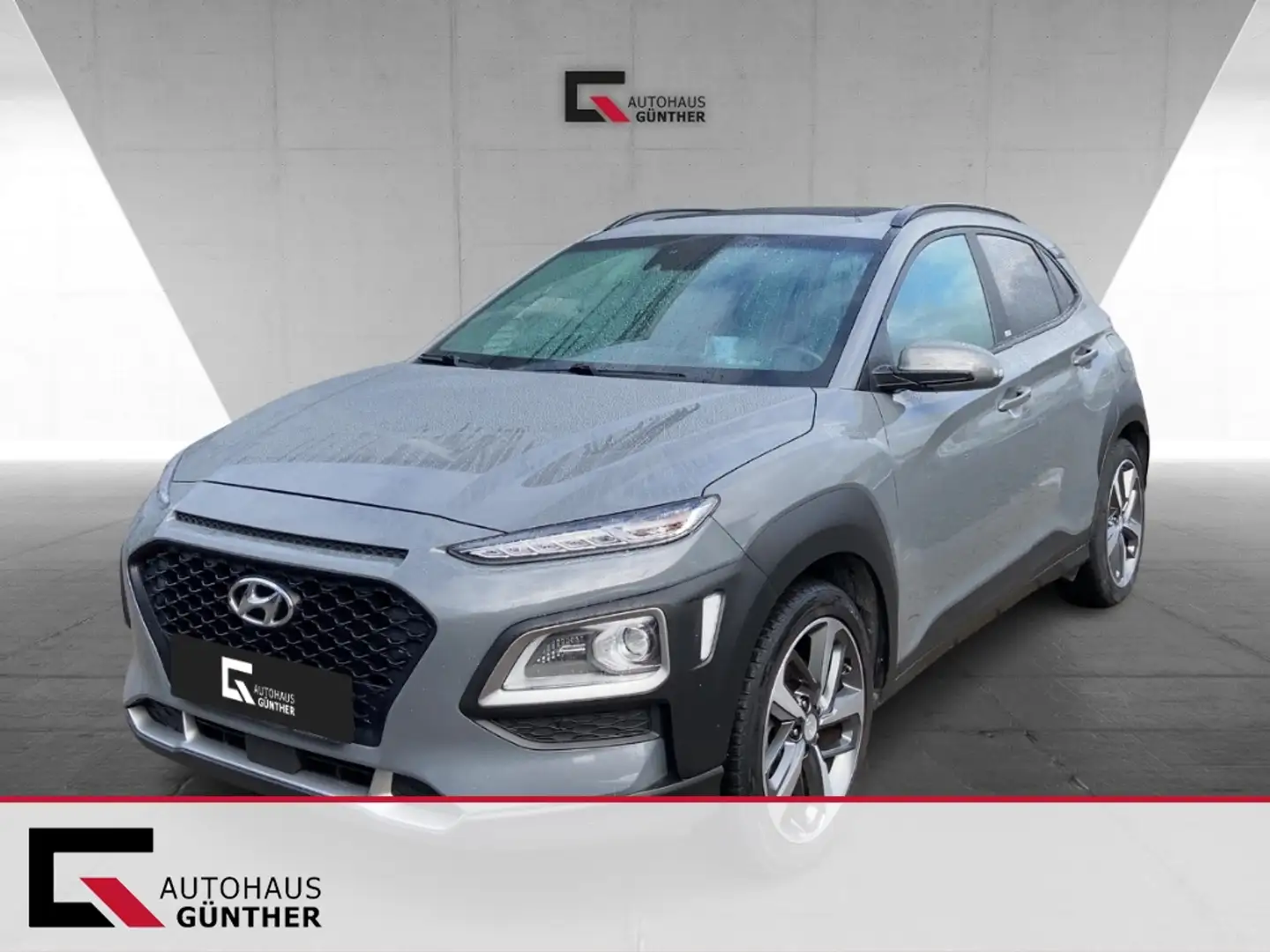 Hyundai KONA Advantage+ 1.0 2WD T-GDI Kamera SitzHzg. Glasd. Grijs - 1