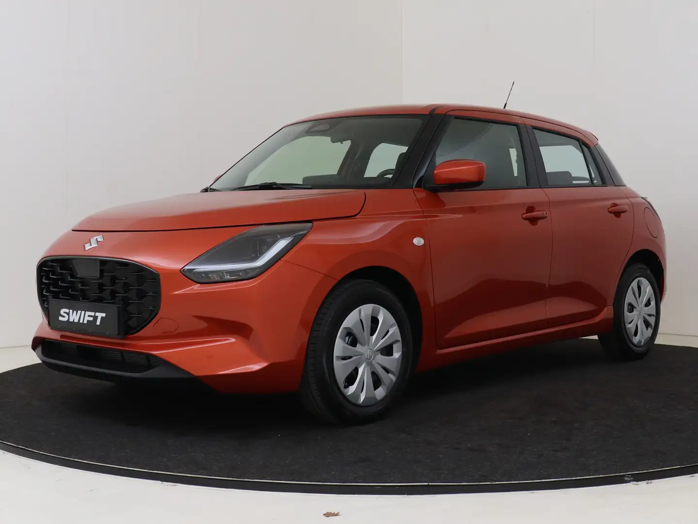Suzuki Swift 1.2 Comfort Smart Hybrid Levering juli 2025 Oranje - 1