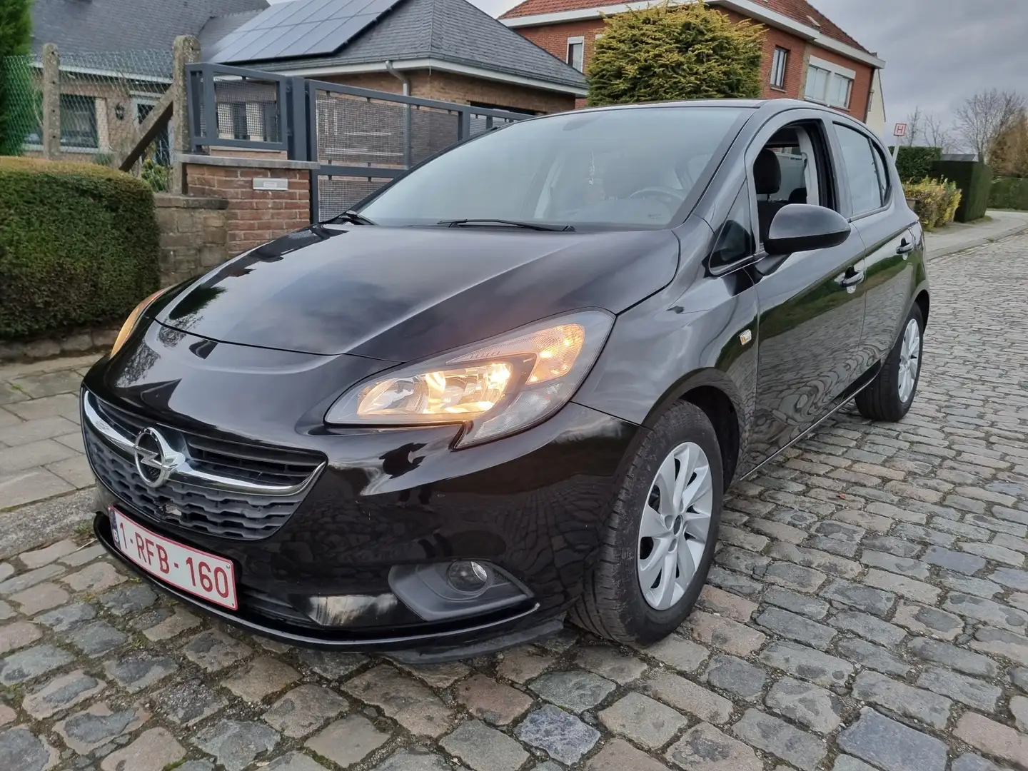 Opel Corsa 1.2i Enjoy Noir - 1