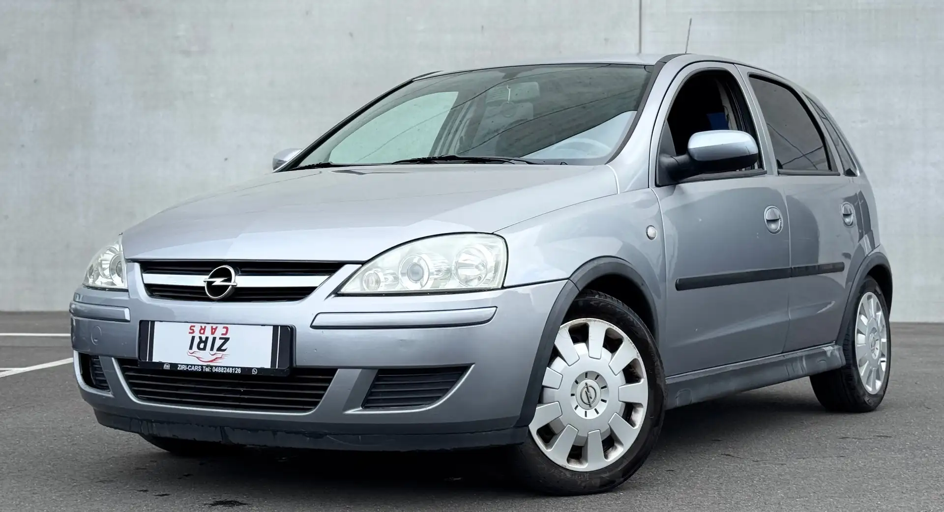 Opel Corsa Corsa 1.2 16V Sport - Airco - elek ruiten - Zilver - 1