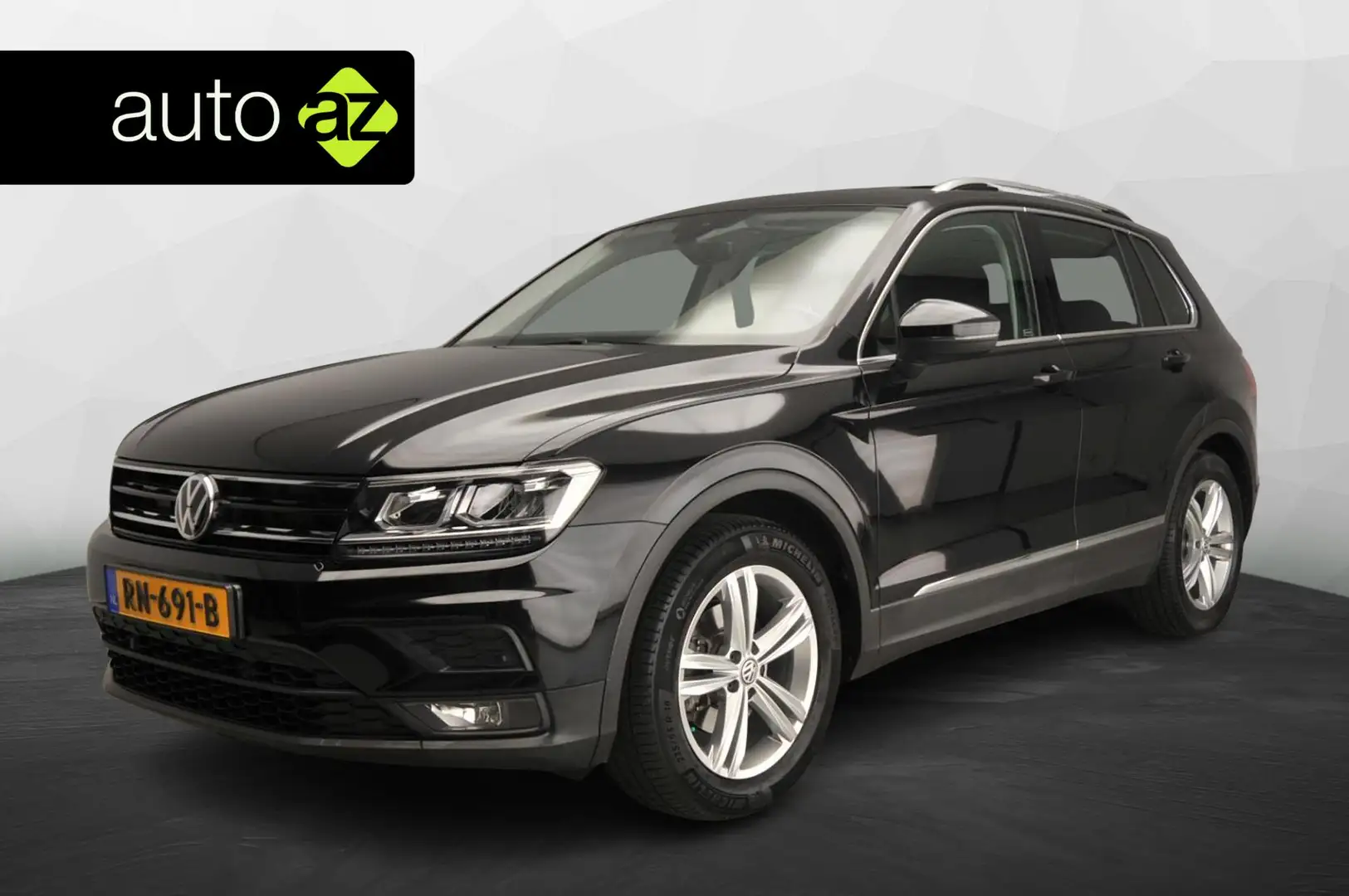 Volkswagen Tiguan 1.4 TSI Comfortline Business | Trekhaak | Panorama Zwart - 1