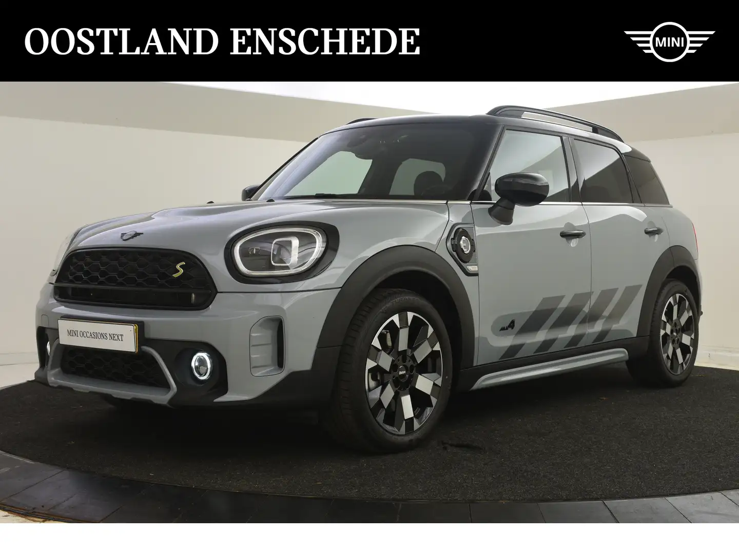 MINI Cooper S Countryman E ALL4 Untamed Automaat / Achteruitrijcamera / Com Grijs - 1