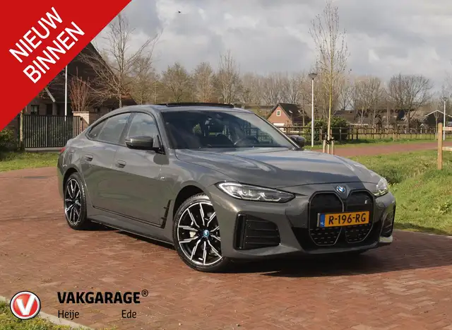 BMW i4 eDrive40 84 kWh | M-Pakket | Schuifdak | Camera |