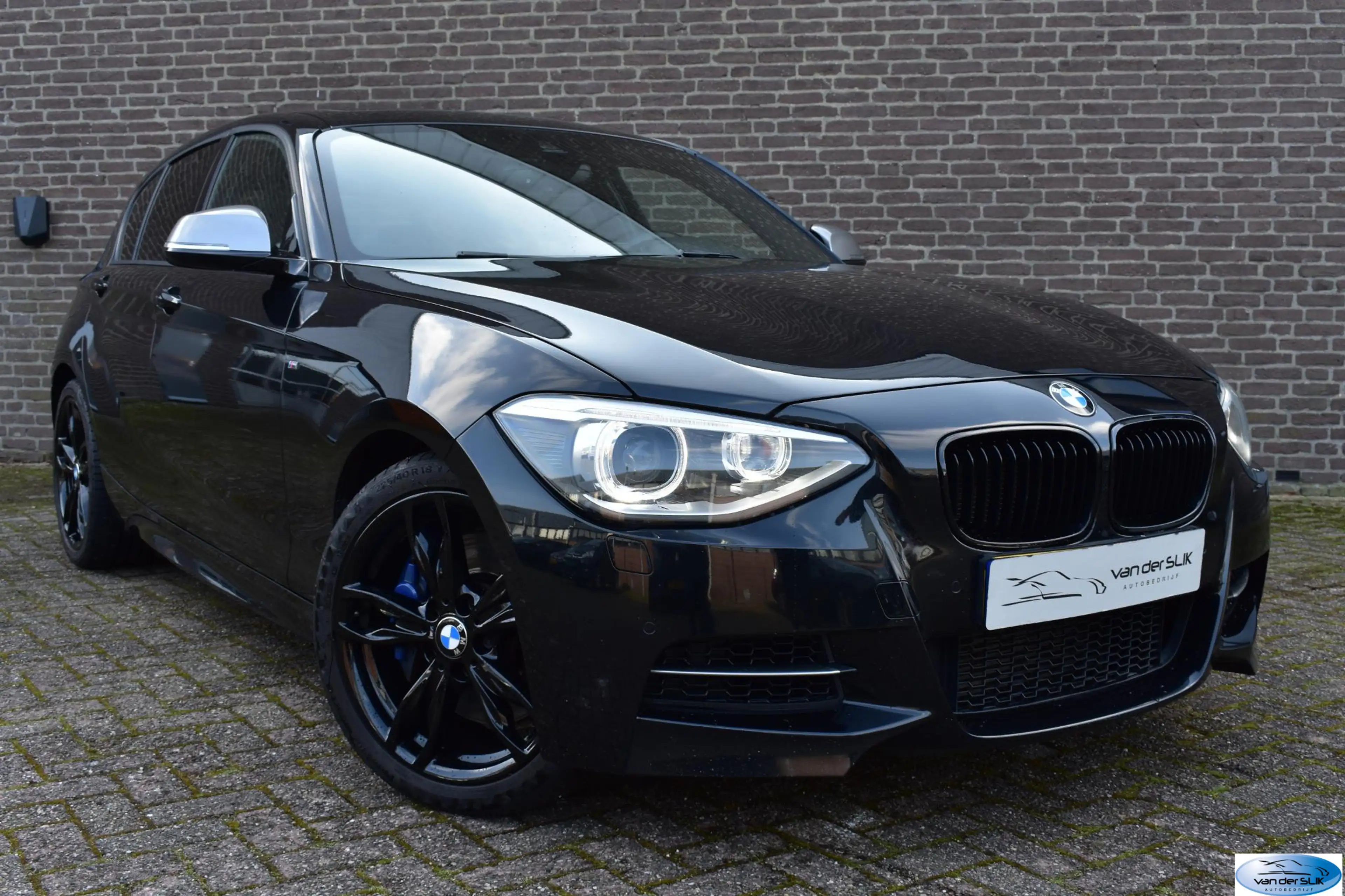 BMW 135 1-serie M135i xDrive High Executive Schuif / Kante