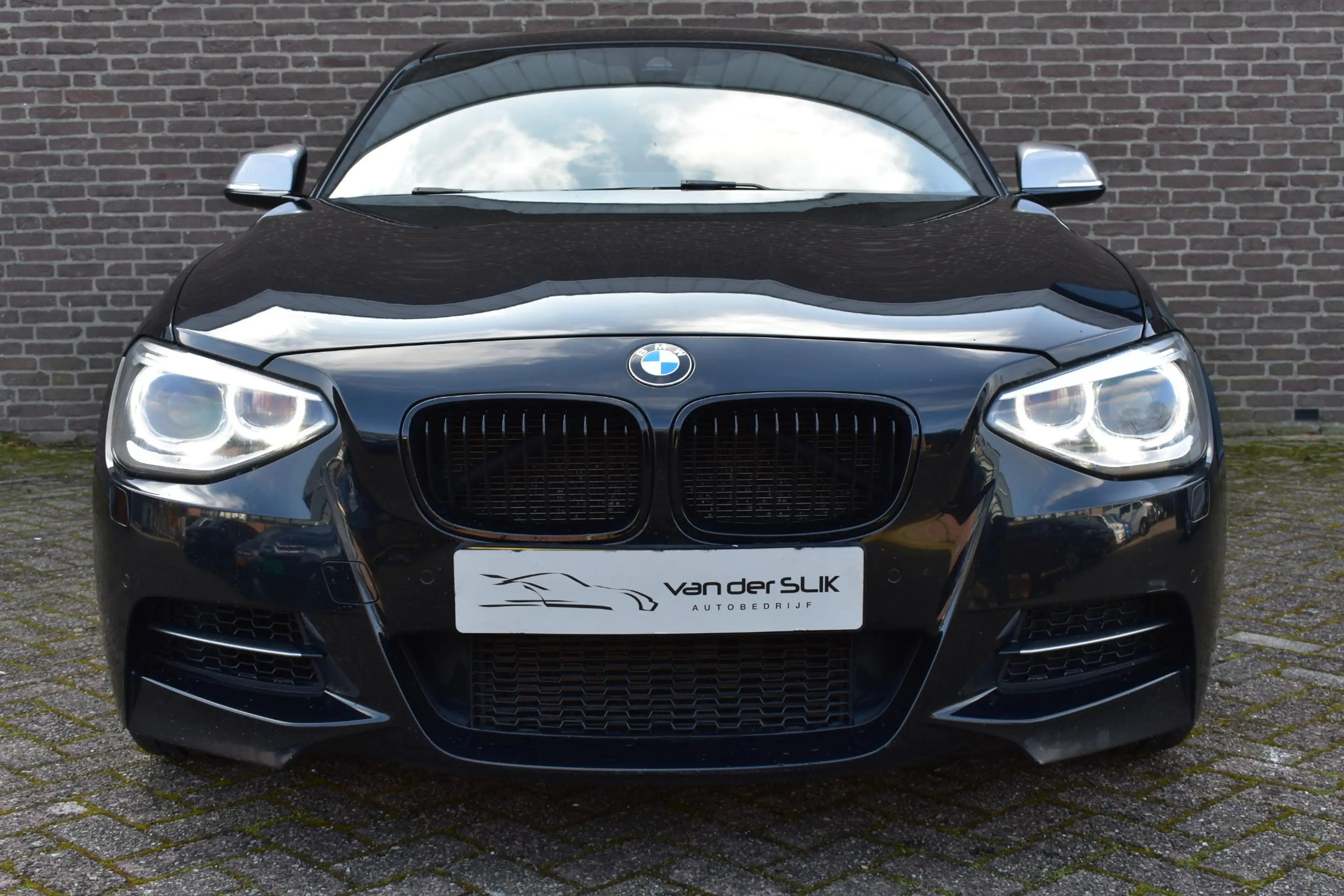 BMW 135 1-serie M135i xDrive High Executive Schuif / Kante — photo 2