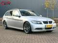 BMW 335 3-serie Touring 335i High Executive / NL-auto / OH Grijs - thumbnail 1